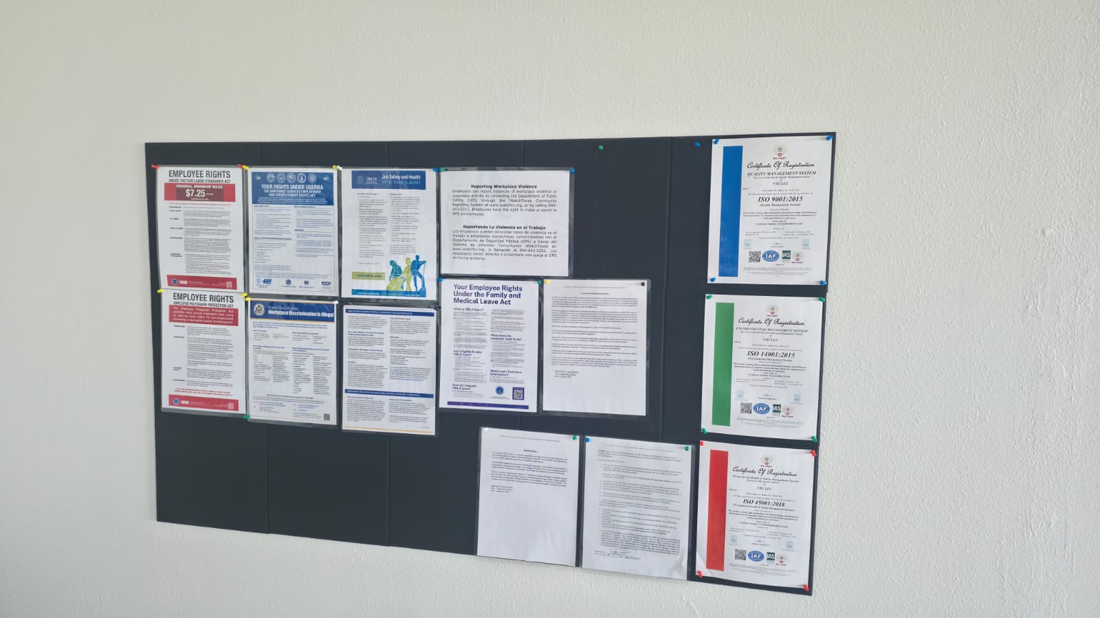 VIG LLC ISO 9001, ISO 14001, and ISO 45001 certificates of registration on the facility compliance board