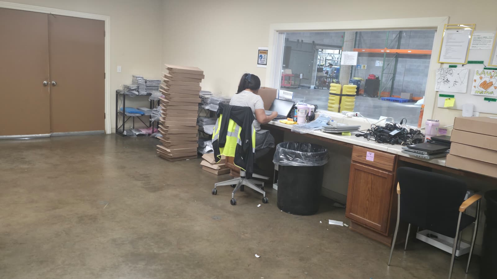 A VIG technician refurbishing a Dell desktop unit at the Dallas facility